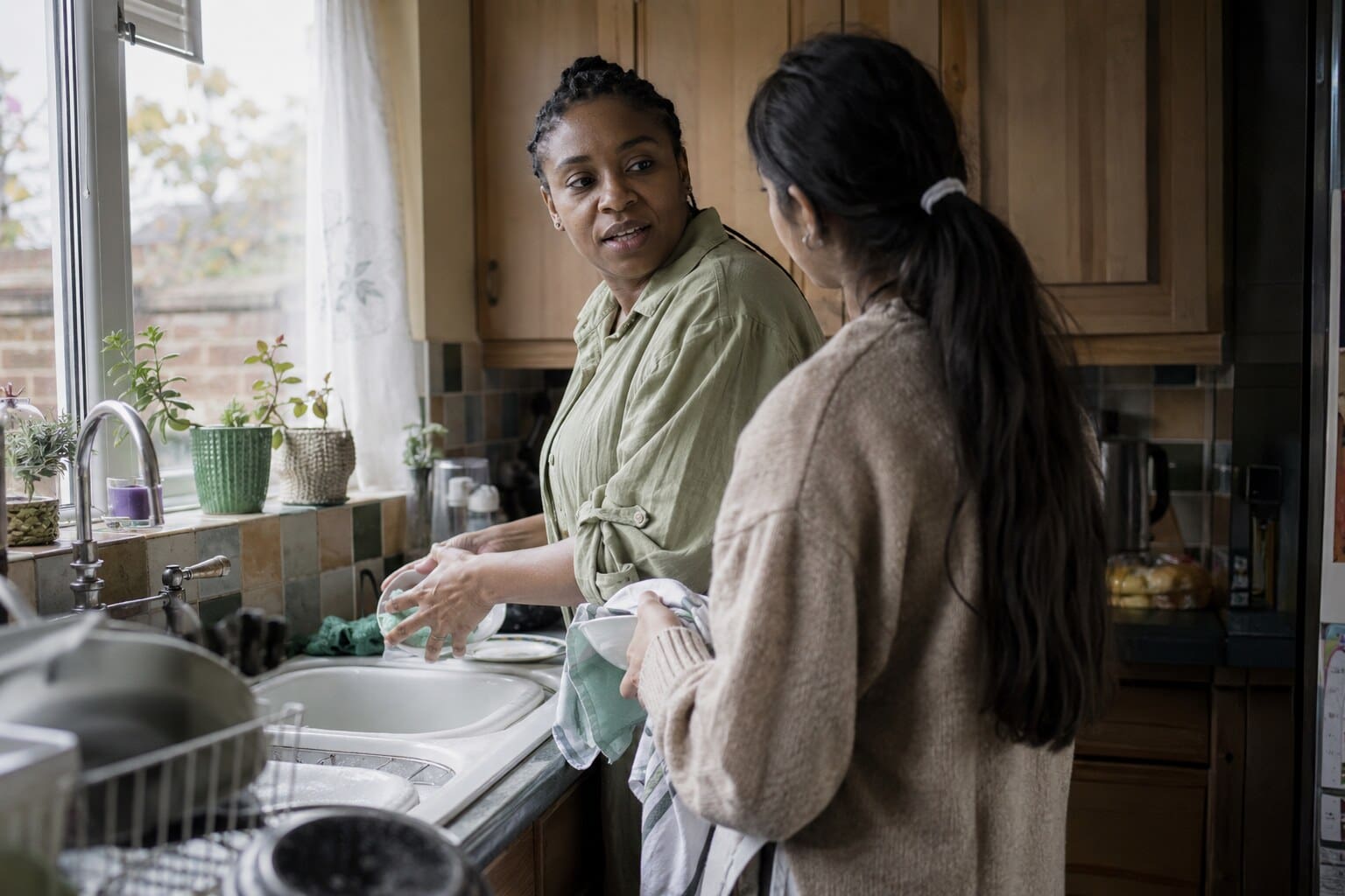 Adults talking together at home